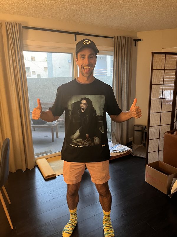 Tommy Hallal grinning with both thumbs up